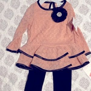 Matching pink dressy tunic and black leggings